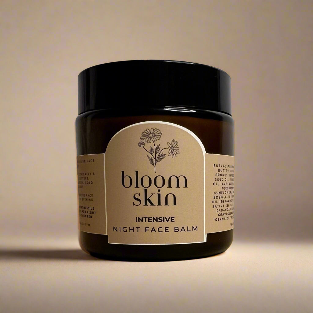 Jar of 'bloom skin' intensive night face balm on a beige surface with a light gray background